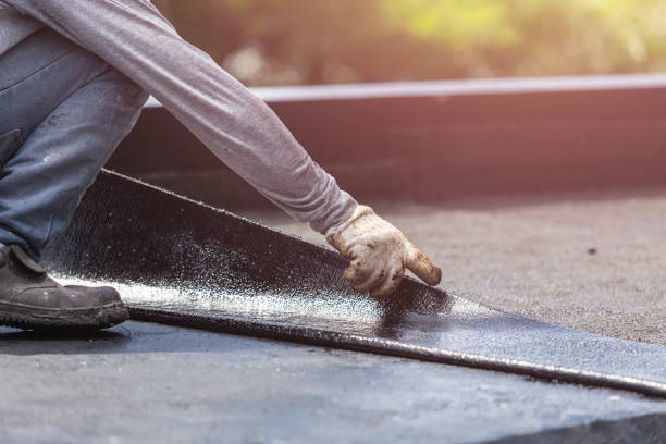 Professional Waterproofing technician working in New Lothrop, MI
